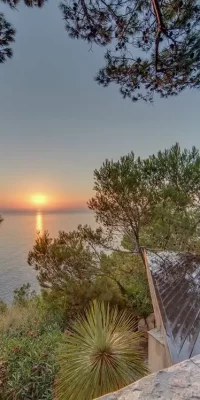 Cautivadora casa en primera línea con impresionantes vistas del atardecer